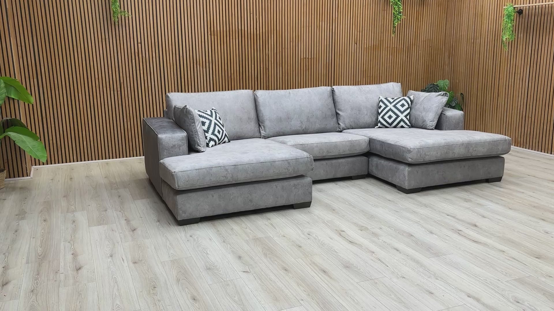 Video tour showcasing the 'Larry' silver velvet chaise sofa, demonstrating its scale and plush upholstery.