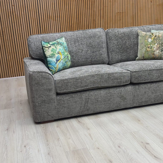 Video of Furniture Village ‘Emilia’ classic 4-seater sofa, elegantly tailored in a luxurious mink colored woven fabric.