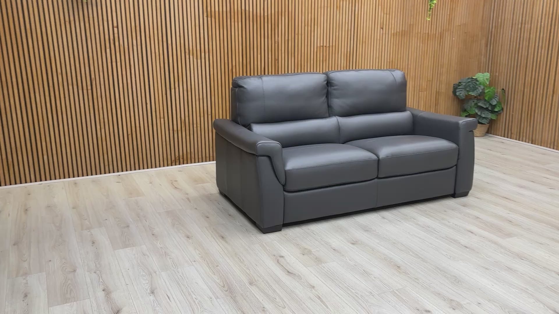 Product video tour of the ‘Amore’ Medium Grey Cat-50 Leather 3-Seater Sofa, providing a 360-degree view of the design and upholstery quality.