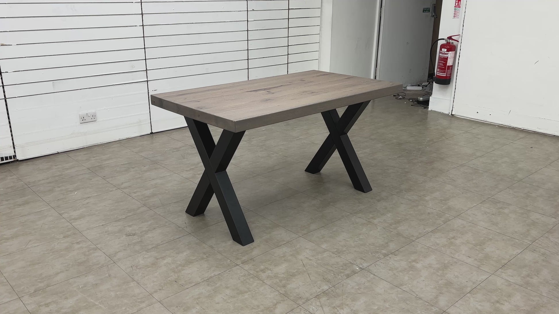Product walk-around video detailing the solid oak construction and the industrial-style metal base.