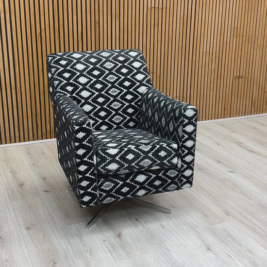 Video tour of the ‘Vera’ swivel chair, demonstrating its smooth 360-degree rotation and fabric texture.