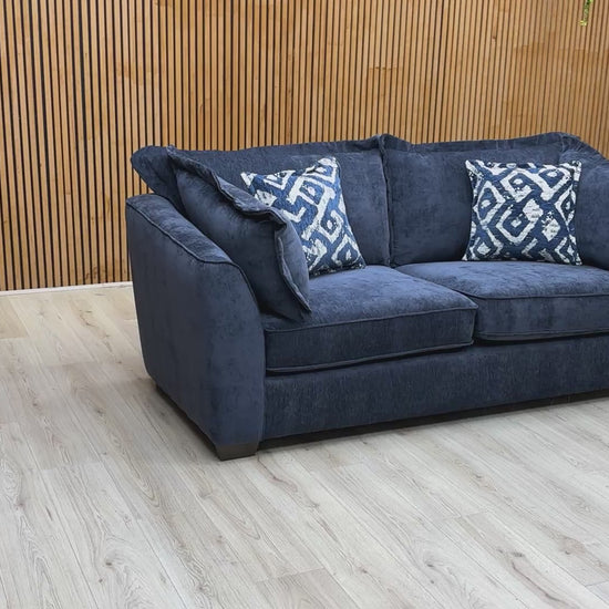 Product video tour of the ‘Finchley’ Denim Blue Soft Weave 3 Seater Sofa, demonstrating the fabric’s tactile quality, seat rebound, and overall build quality.