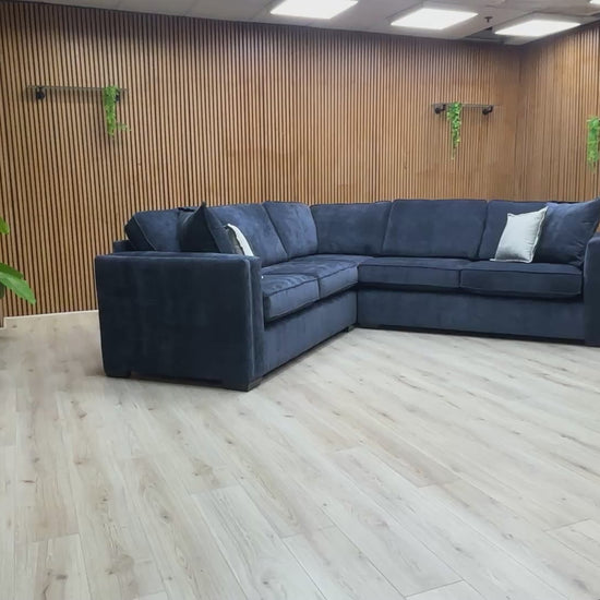 Video walk-around of the Chelsea denim blue chenille corner sofa, highlighting the fabric texture and cushion depth.