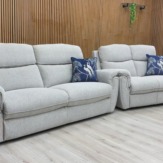 Product video tour of the ‘Ashton’ Bariba Grey 3+2 Power Recliner Set, demonstrating the smooth reclining motion, fabric texture, and overall comfort.