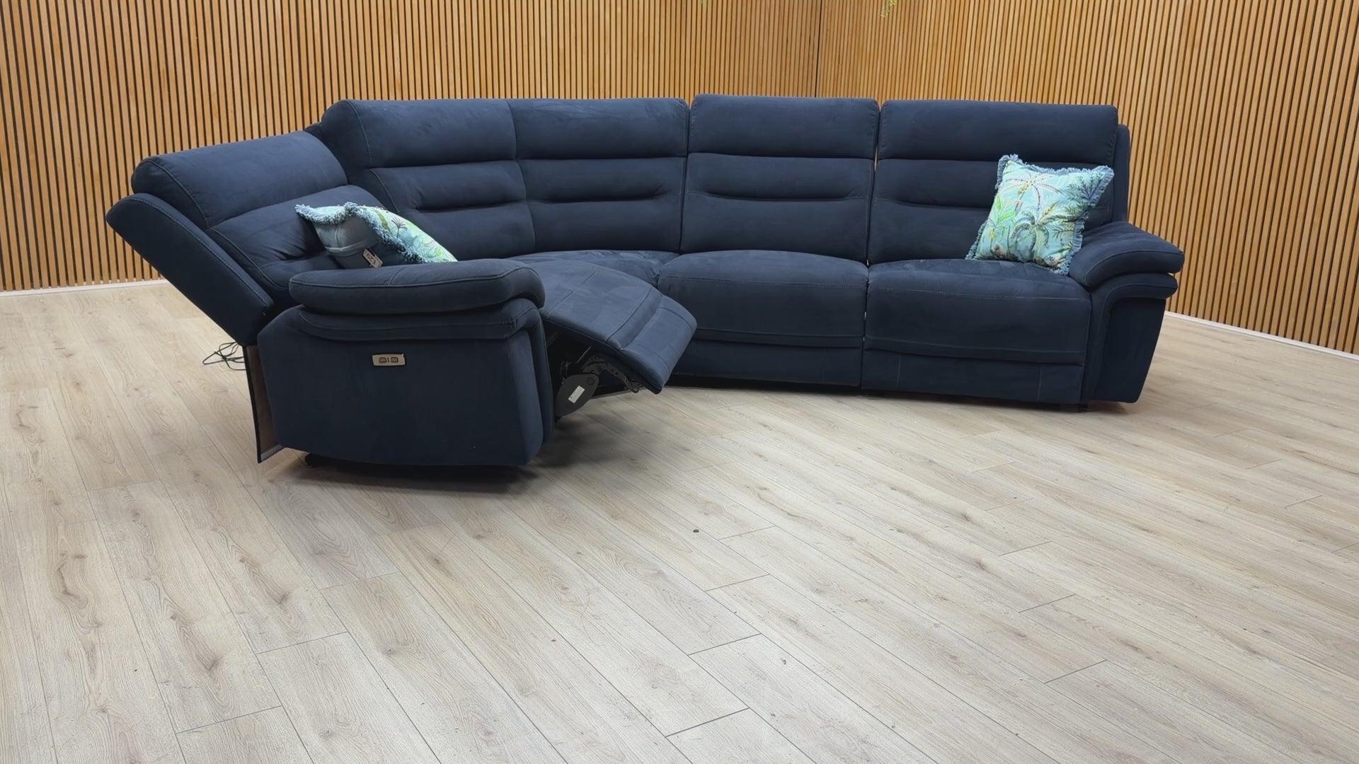 Video demonstration showing the whisper-quiet operation of the power recliner and adjustable headrests on the Berlin sofa.