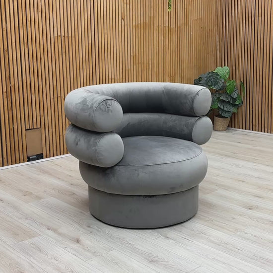 Product showcase of the Fitzrovia Charcoal Velvet Accent Chair, detailing the soft fabric sheen, build quality, and leg assembly.