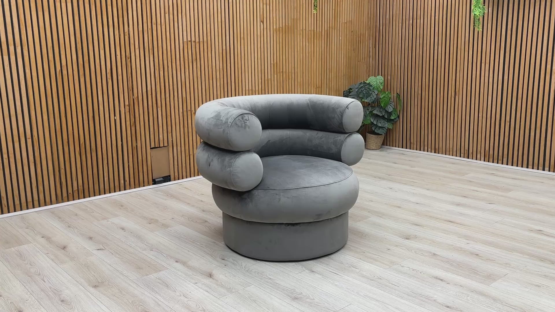 Product showcase of the Fitzrovia Charcoal Velvet Accent Chair, detailing the soft fabric sheen, build quality, and leg assembly.