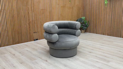 Product showcase of the Fitzrovia Charcoal Velvet Accent Chair, detailing the soft fabric sheen, build quality, and leg assembly.
