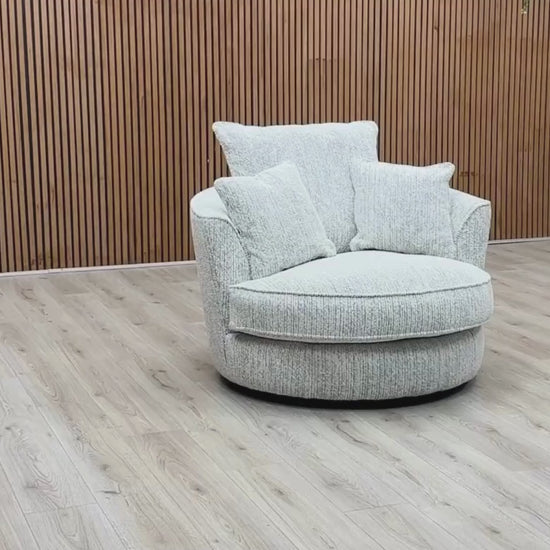 Video Of ‘Legend’ contemporary swivel armchair, beautifully upholstered in luxurious Gabriel Snow Grey fabric with a classic comfortable backrest design.