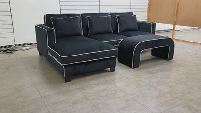 ‘Demure' Black Demure Velvet Left Hand Facing Arm 4 Seater Chaise Sofa + Banquette Footstool