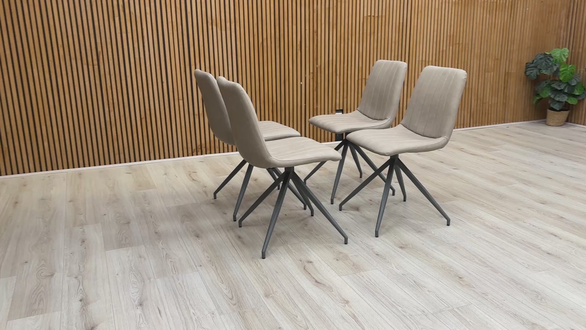 Video for a product video demonstrating the quality and features of the 'Isaac' Taupe Faux Leather Dining Chair.