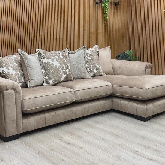 Video tour highlighting the soft texture, premium feather-like comfort of the pillow back arrangement, and fabric durability of the Dolcie caramel sofa.