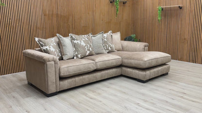 Video tour highlighting the soft texture, premium feather-like comfort of the pillow back arrangement, and fabric durability of the Dolcie caramel sofa.