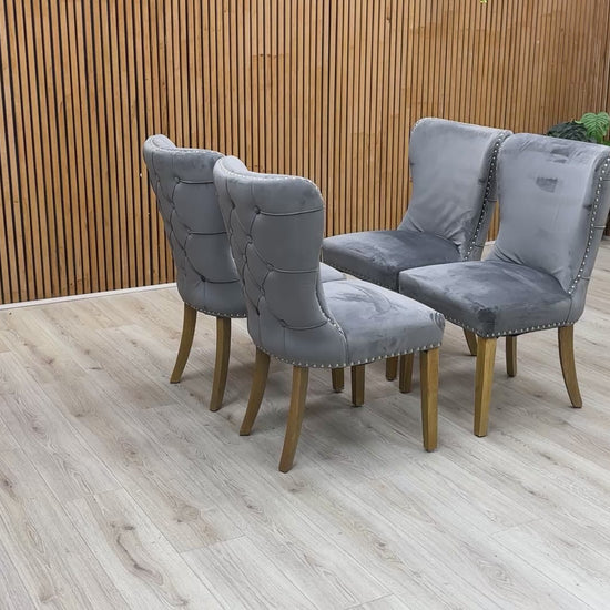 Product video tour of the ‘Chennai’ Grey Luxe Velvet Studded Dining Chairs, demonstrating the fabric’s shimmer, the sturdy frame build, and the high-quality finish.