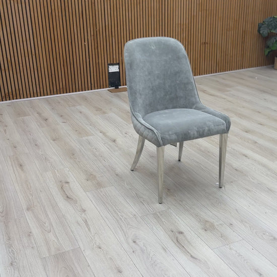 Video Of ‘Dolce’ contemporary dining chair, beautifully upholstered in a sophisticated, plush Grey velvet with clean, modern lines.