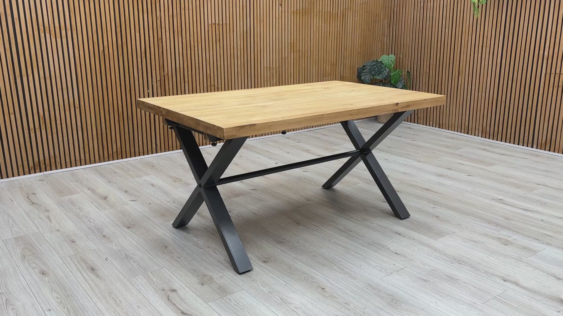 Product video tour of the Furniture Village ‘Earth’ Solid Oak 150cm Fixed Dining Table, demonstrating the rustic oiled finish texture, structural stability, and surface thickness.