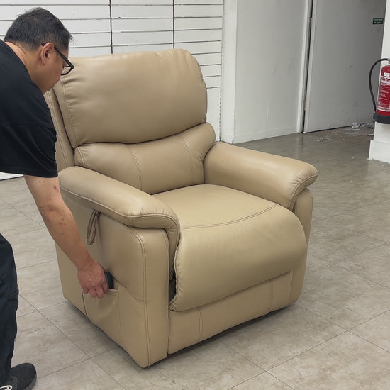 The 'Evelyn' chair in the fully raised and tilted "lift and rise" position, assisting the user in standing up safely.