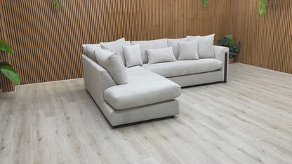 Video walkaround of the Barney silver towel velvet corner sofa, showcasing its scale, fabric sheen, and left-hand configuration.