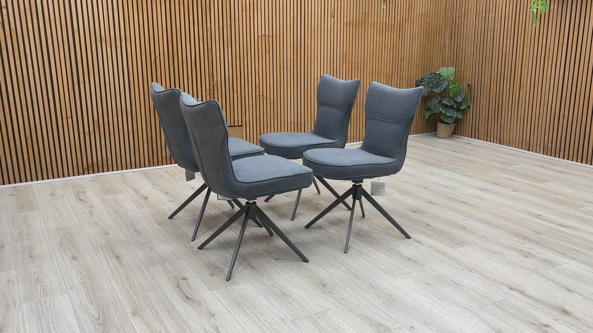 Product video tour of the ‘Carrera’ Grey Fabric Swivel Dining Chairs, demonstrating the smooth auto-return swivel mechanism, fabric durability, and overall structural stability.