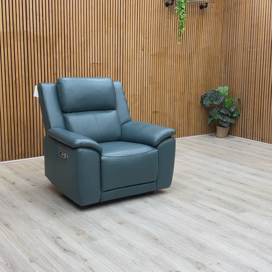 Product video tour of the ‘Utah’ Midnight Jade Leather Power Recliner, demonstrating the smooth reclining action, adjustable headrest, and integrated heating system.