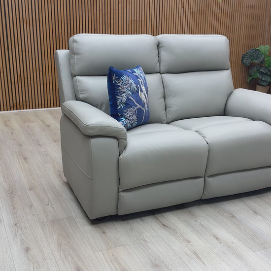 Product walkthrough of the Raven 2-seater sofa, demonstrating leather texture and seat comfort.