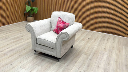 Product walkthrough video of the 'Melody' pearl chenille armchair, showcasing the fabric quality, cushioning depth, and overall build.