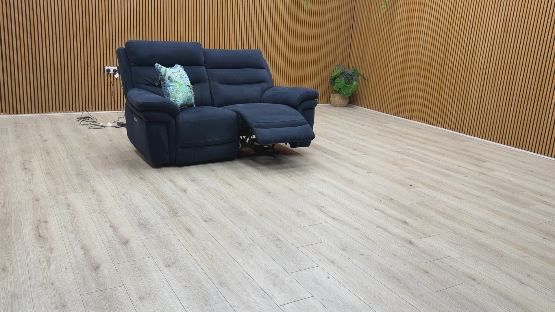 Video demonstration of the smooth power recliner and headrest adjustment on the Berlin 2-seater velvet sofa.