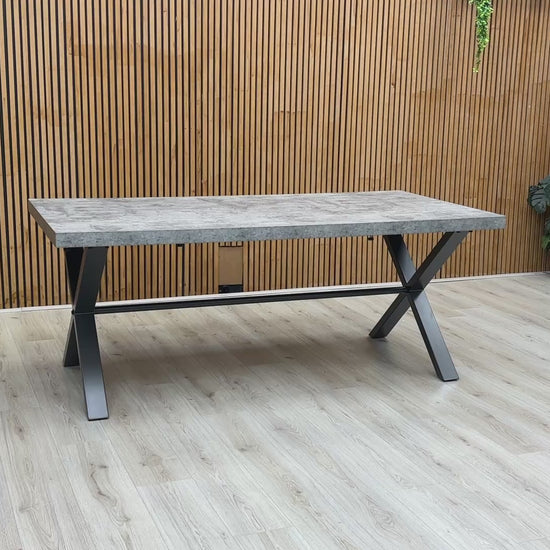 Product video tour of the ‘Moon’ Grey Concrete Effect Dining Table, demonstrating the surface texture, stability, and how to add the 50cm extension leaf.
