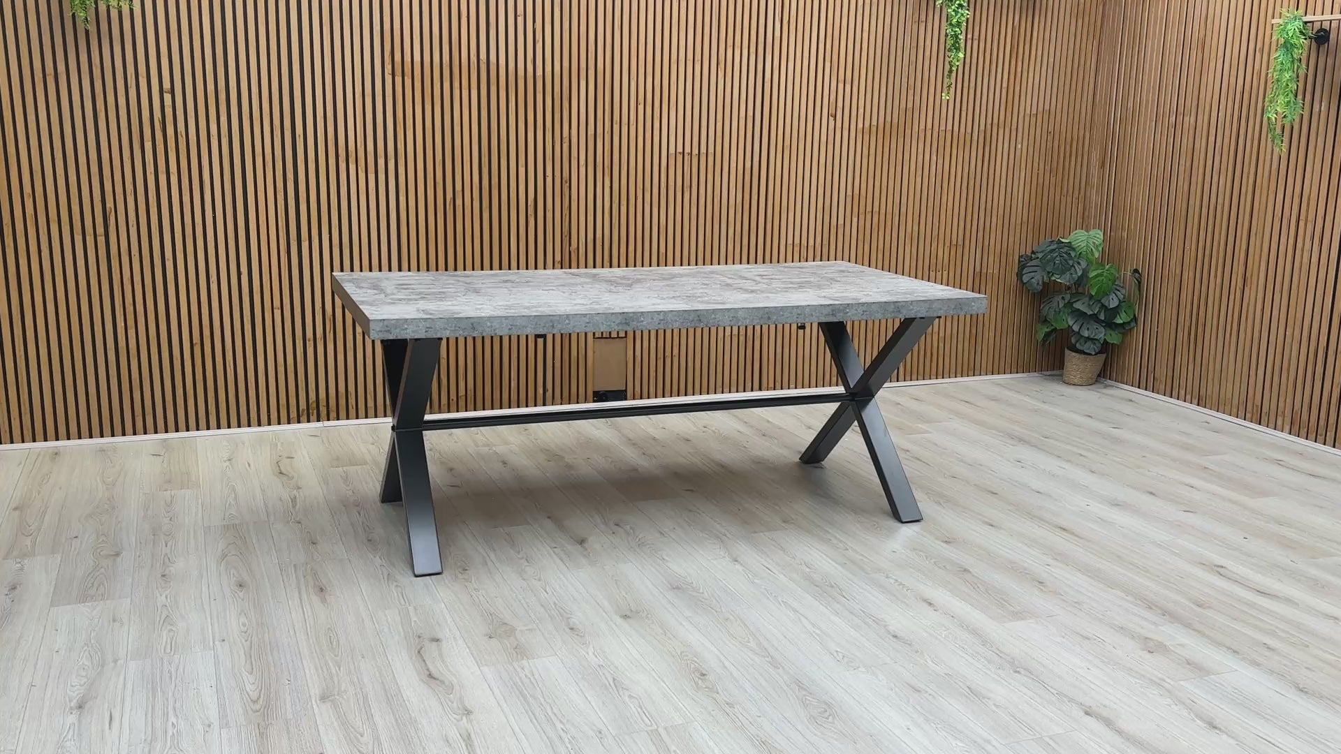 Product video tour of the ‘Moon’ Grey Concrete Effect Dining Table, demonstrating the surface texture, stability, and how to add the 50cm extension leaf.