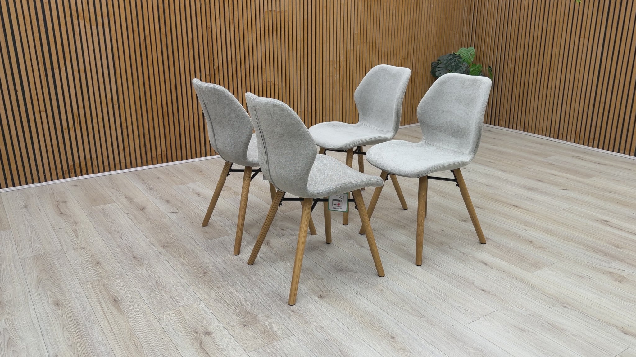 Product video tour of the ‘Stockholm’ upholstered dining chairs, demonstrating the fabric texture, foam cushioning comfort, and overall build quality.