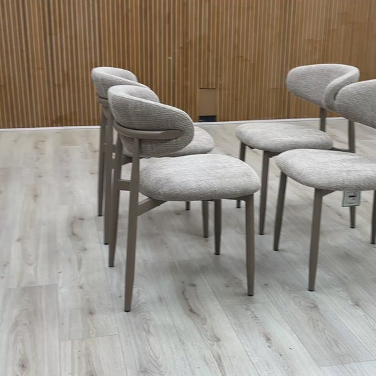 Video overview of the Aimar set of 4 dining chairs, showcasing the open-back silhouette and fabric quality.