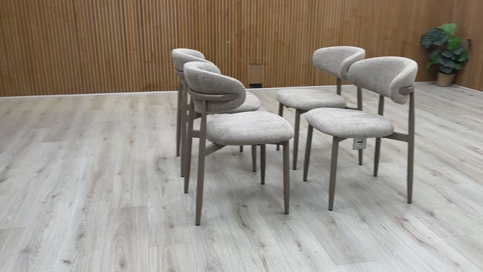 Video overview of the Aimar set of 4 dining chairs, showcasing the open-back silhouette and fabric quality.
