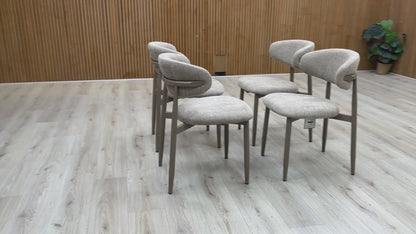 Video overview of the Aimar set of 4 dining chairs, showcasing the open-back silhouette and fabric quality.