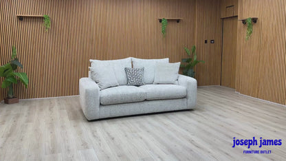 Video Of ‘Pandora’ contemporary living room suite, showcasing a luxury 3-seater sofa beautifully upholstered in a stylish Chevron Silver fabric with elegant structural lines.