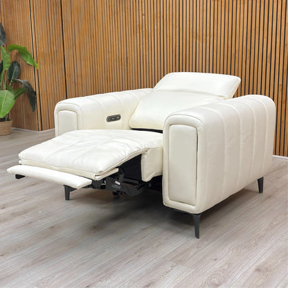 Lifestyle shot of the Elphaba chair in a bright, modern interior living space.