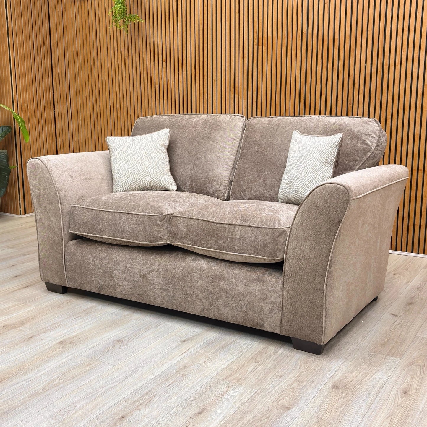 Lifestyle shot of the 'Rosie' Nutmeg 2 Seater Sofa, showing the full design and fabric.
