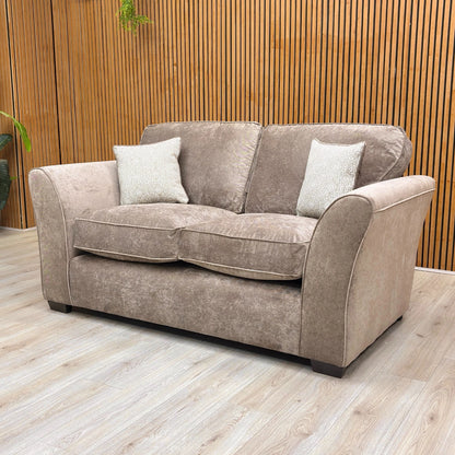 Lifestyle shot of the 'Rosie' Nutmeg 2 Seater Sofa, showing the full design and fabric.