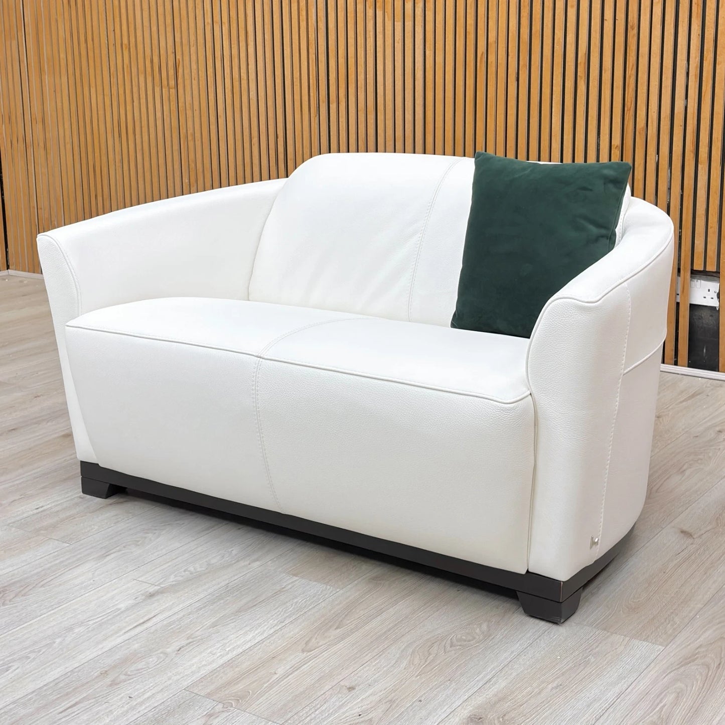 Lifestyle shot of the Nicoletti Ketty sofa in a contemporary living space, illustrating its space-saving 130cm width.