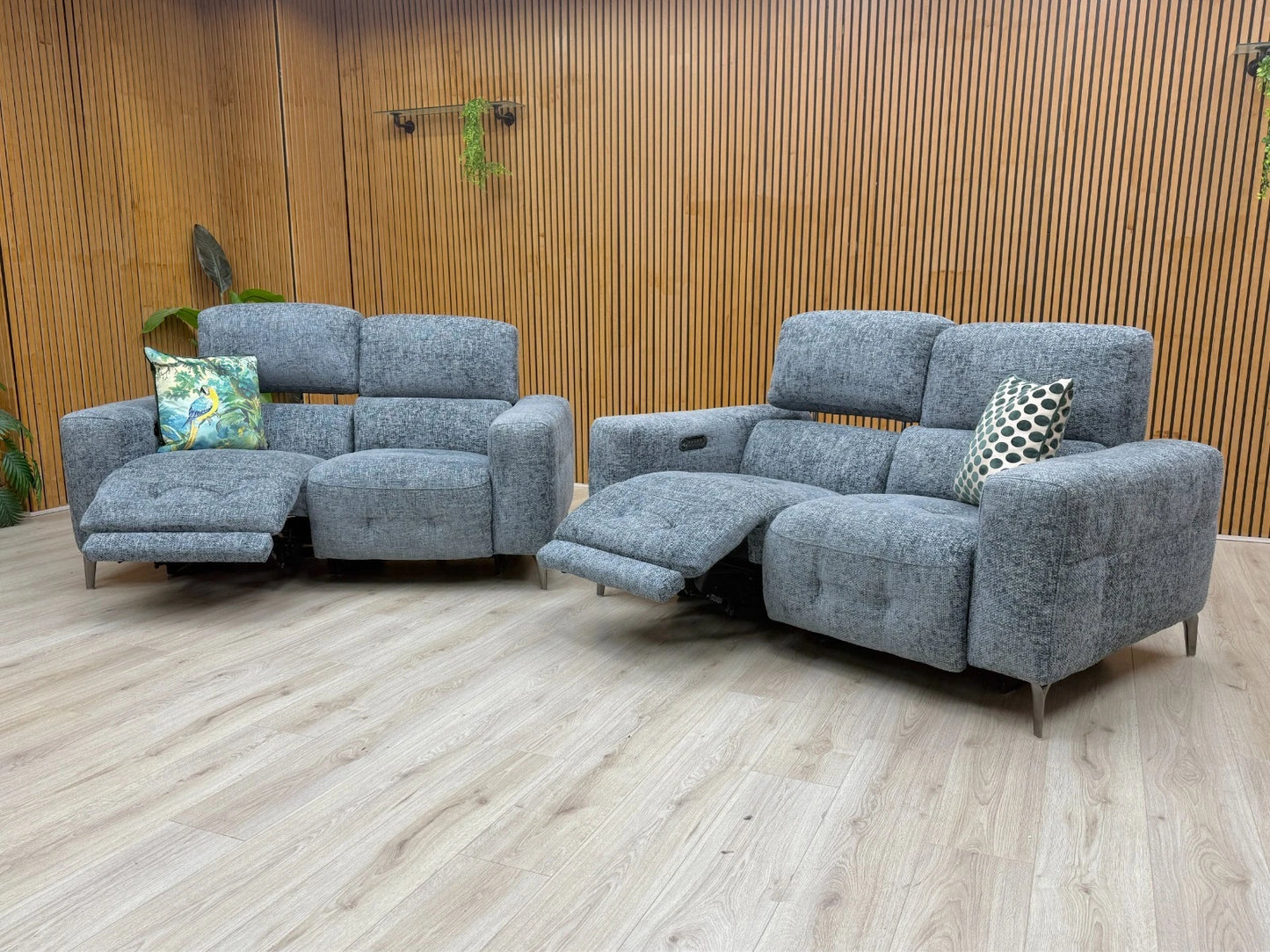 Lifestyle photo showing the 2+2 sofa set arranged together in a modern living room setting.