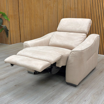Lifestyle shot of the ‘Xavier’ bisque cream power recliner in a cozy living room setting, highlighting its elegant aesthetic and adjustable headrests.