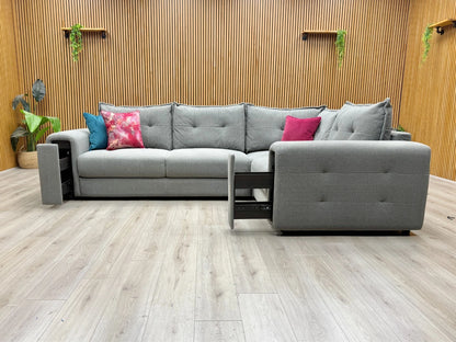 Lifestyle shot of the Goliath corner sofa showcasing the right-hand facing chaise lounge.