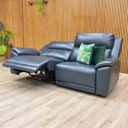 Lifestyle view of the 3-seater power recliner in a home setting, showing its deep navy color and comfortable, upright seating design.