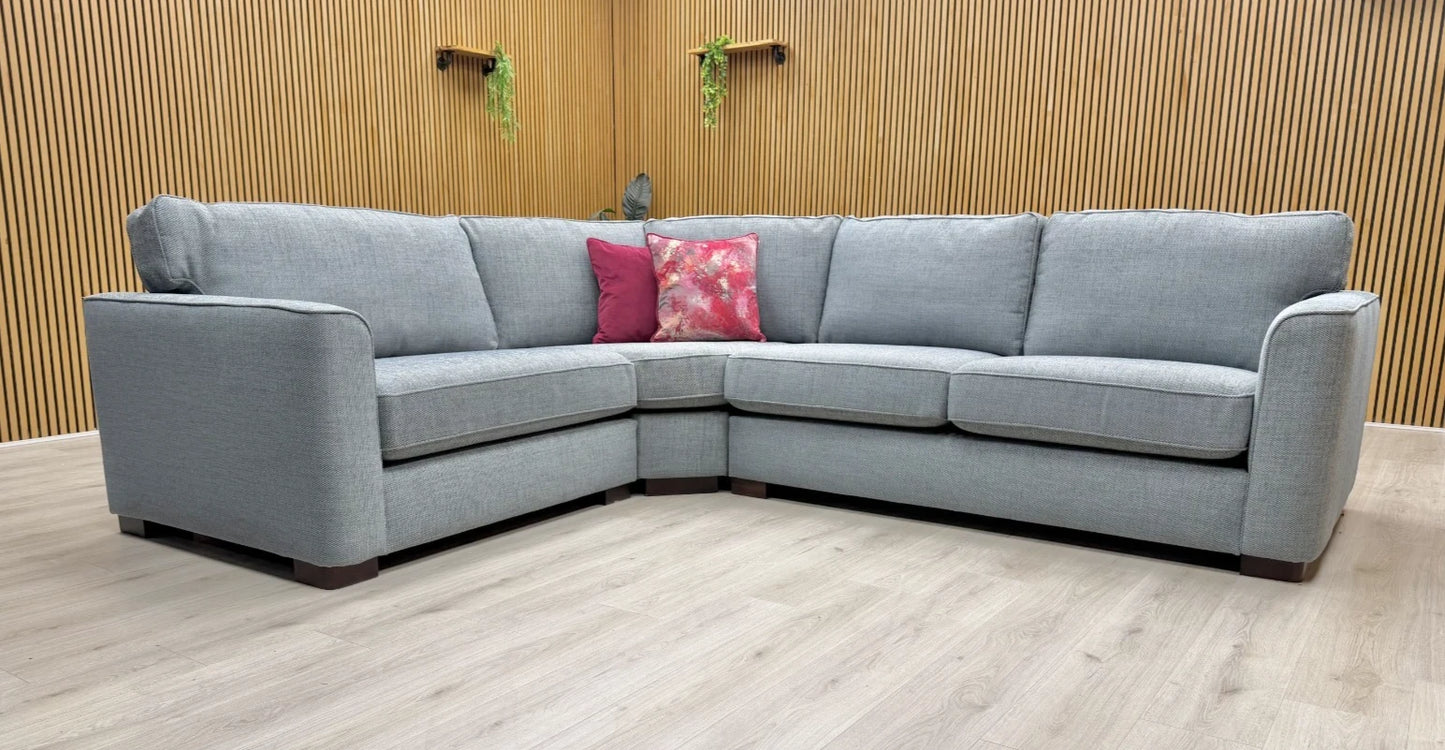 Lifestyle shot focusing on the chaise end of the left-hand facing Elora sofa