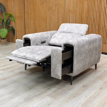 Lifestyle shot of the chair in a modern living room setting, demonstrating its scale and premium look.