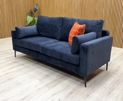 Side profile of the ‘Wren’ 3-seater sofa, showcasing the elegant sloped arm design and deep seat cushions.