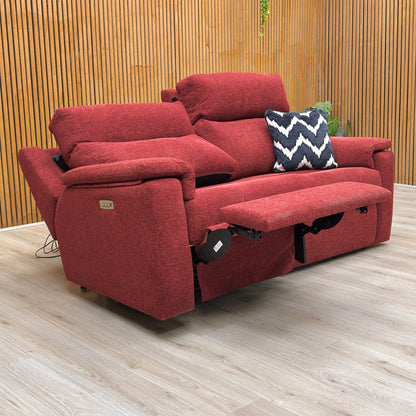 Lifestyle shot of the burgundy red G Plan Thornbury 3-seater sofa, showcasing its rich woven fabric texture and classic, supportive design.