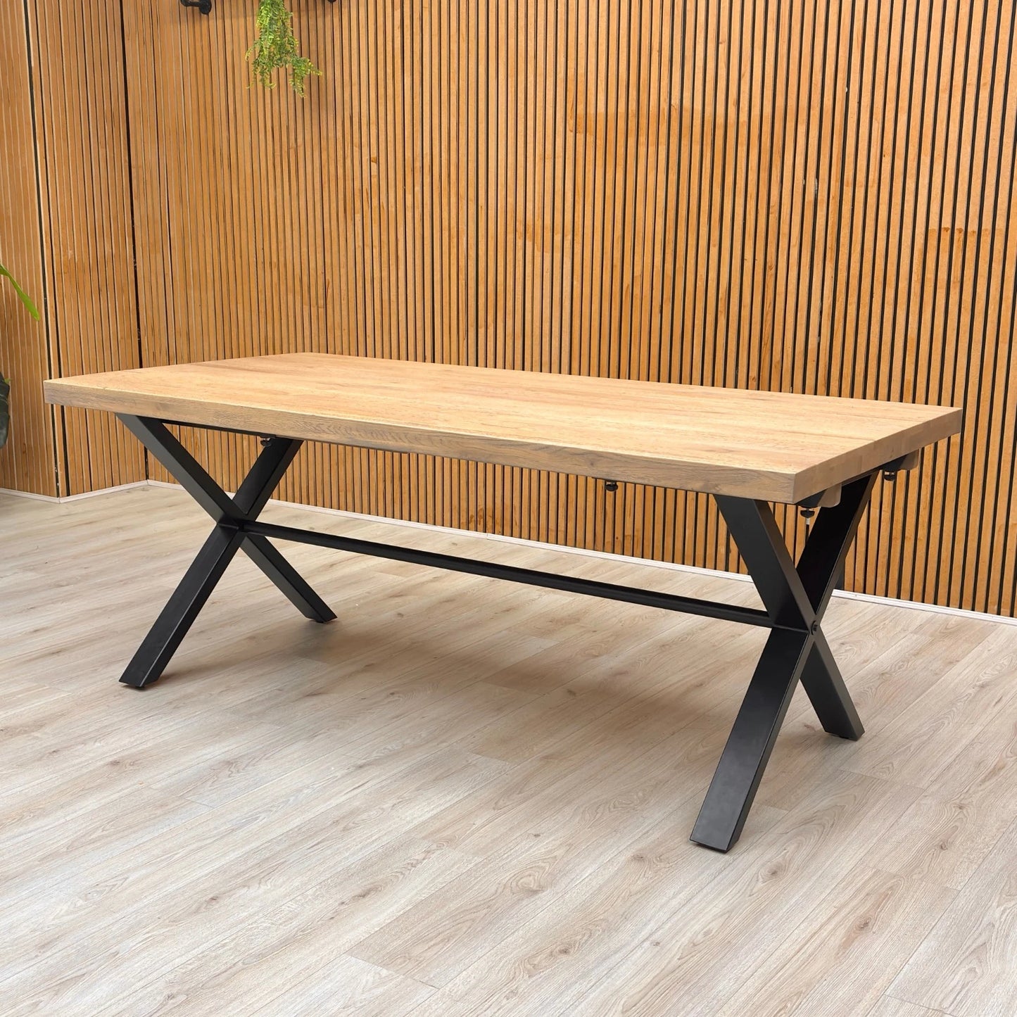 Side view of the Saturn Dining Table showing the proportion and height of the fixed table.