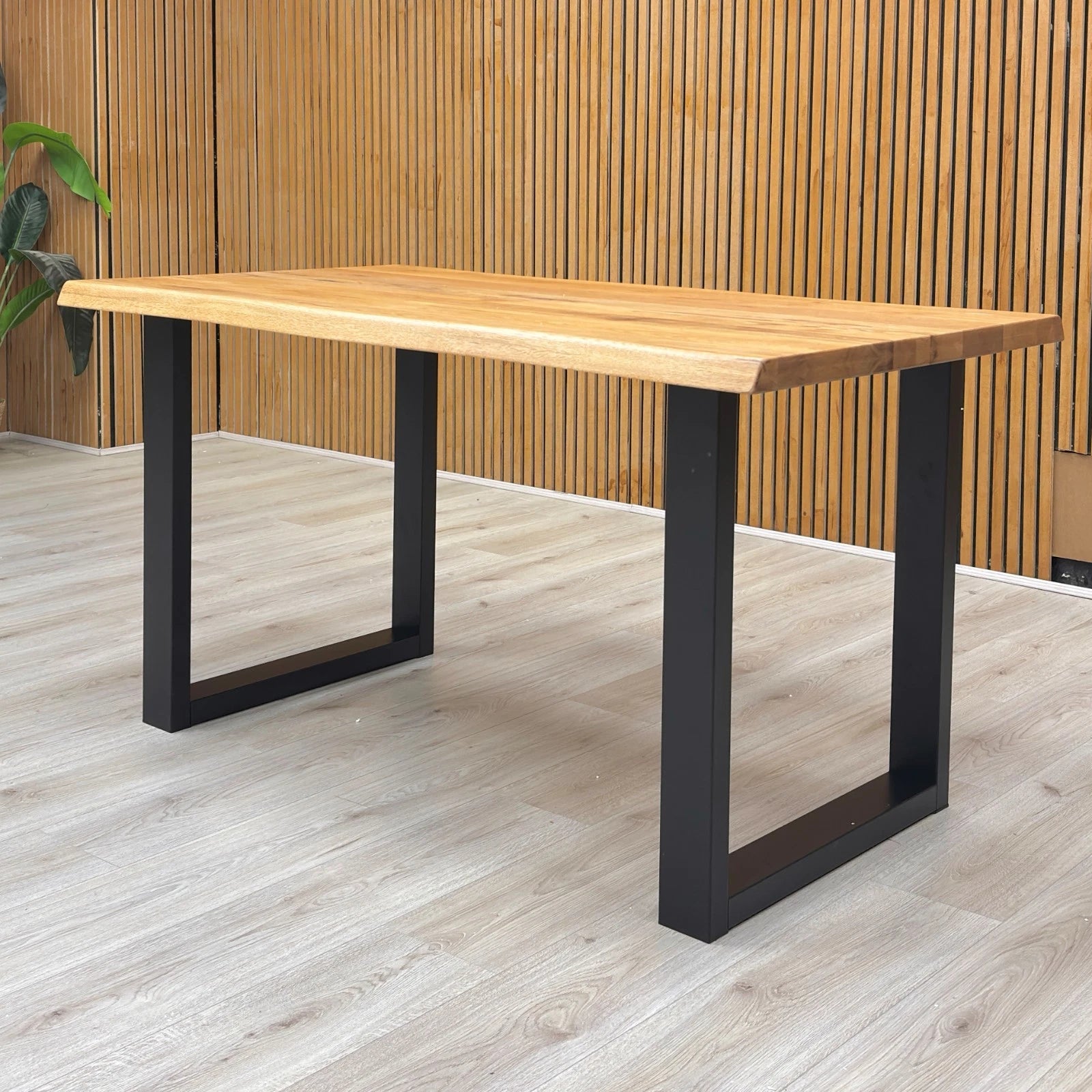 Lifestyle Detail close-up of the raw edge table top, highlighting the natural imperfections and high-quality oiled finish.
