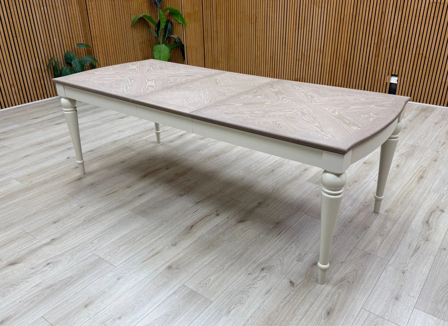 Lifestyle shot of the dining table in a contemporary dining room setting.