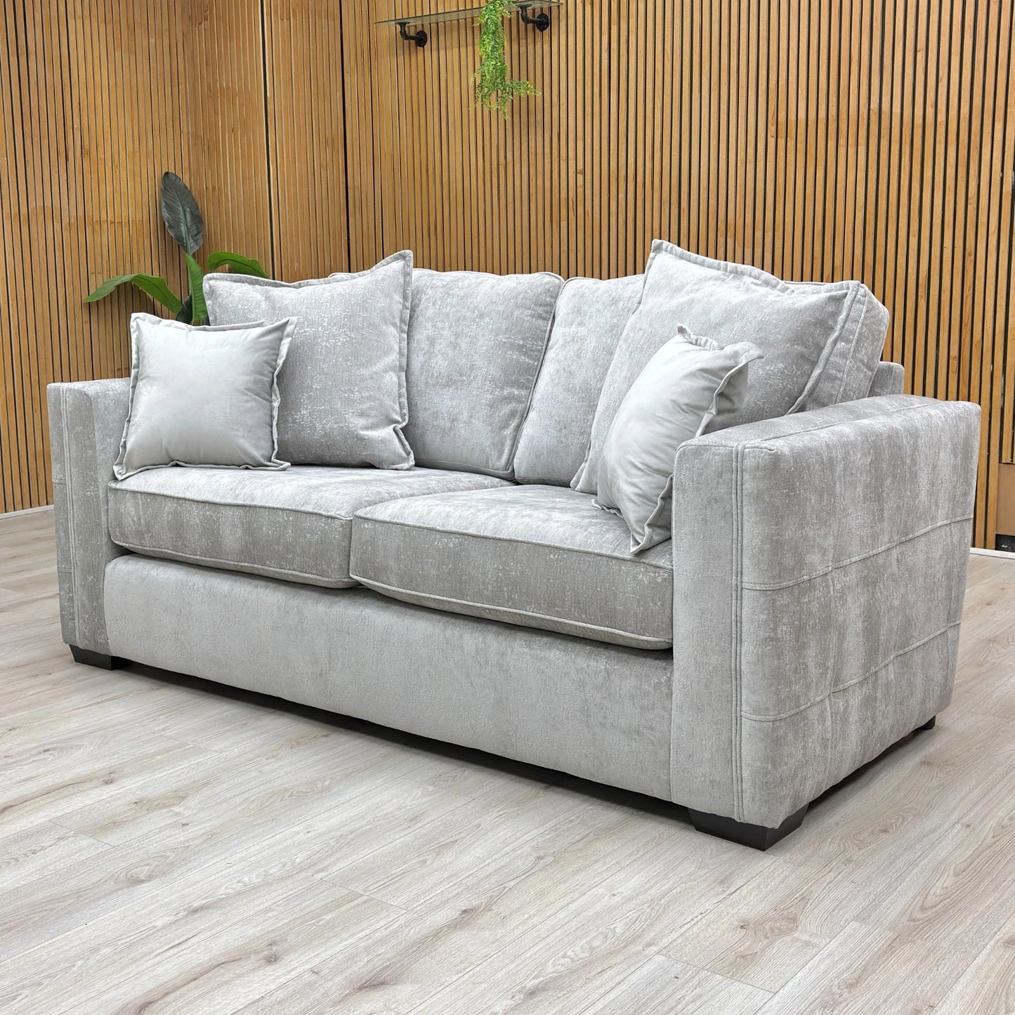 View of the formal back cushions and seat pads, demonstrating the medium-firmness foam filling and tidy piping details.